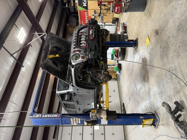 Jeep Wrangler on lift at 310 Auto Techs
